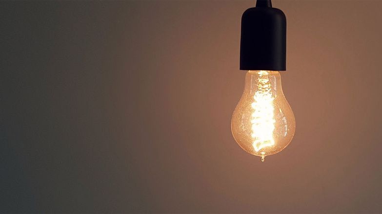 Energy saving light bulb switched on