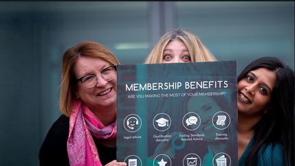 Membership team displaying benefits