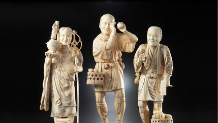 Three figures made from ivory